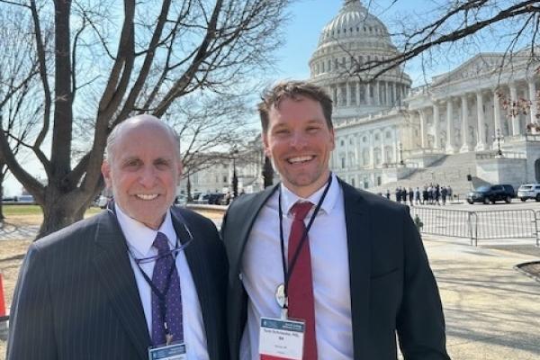 Glenn Preminger and Thomas Schroeder in front of US Capitol