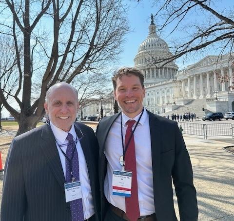 Glenn Preminger and Thomas Schroeder in front of US Capitol