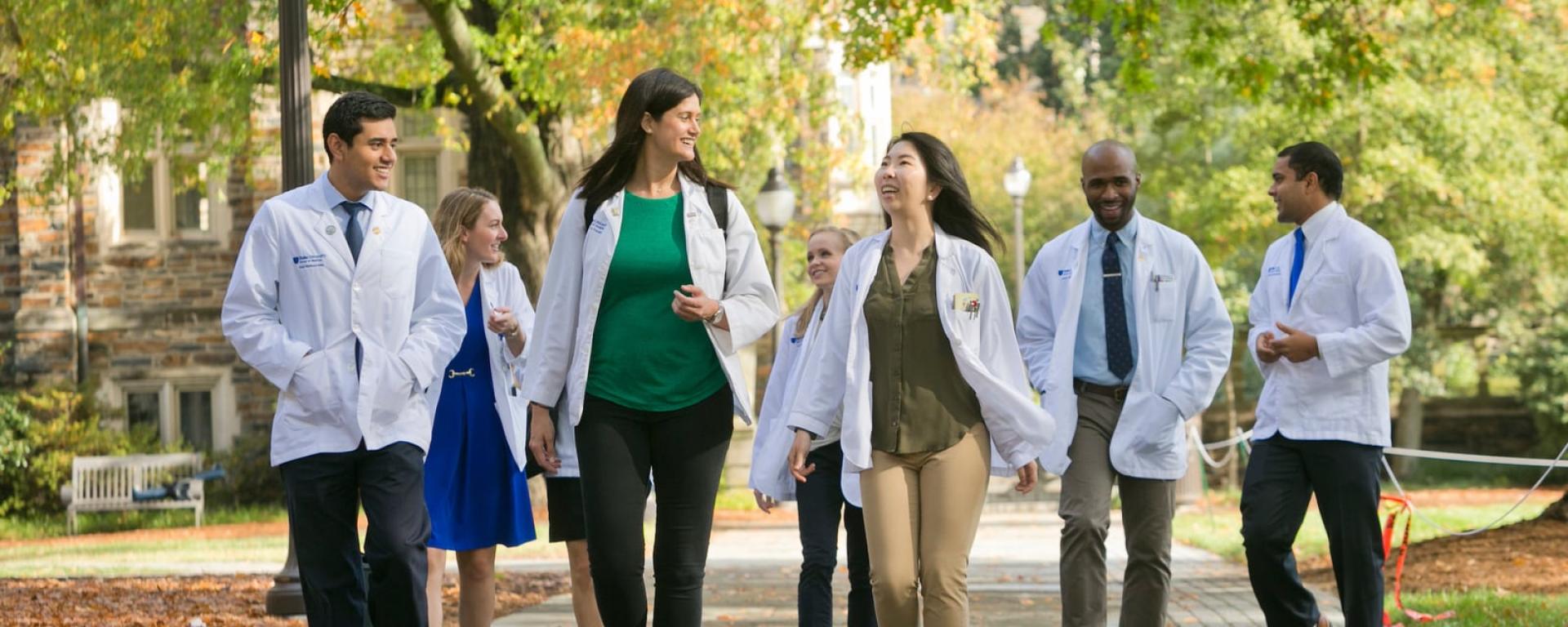 students walking across campus