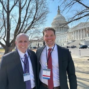 Glenn Preminger and Thomas Schroeder in front of US Capitol